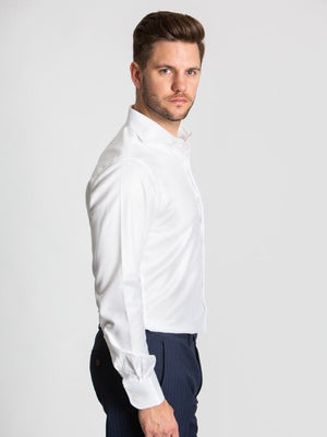 Model wearing cutaway collar white shirt