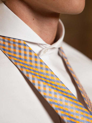 blue and orange tie and dress shirt