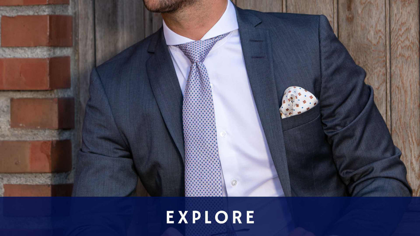 Model wearing extreme cutaway collar white dandy and son shirt with suit