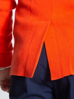Orange Double Breasted Knitted Cashmere Jacket On Model With White Extreme Cutaway Collar Close Up