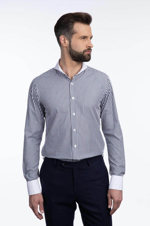 Model wearing extreme cutaway collar big stripe shirt