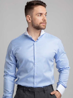 Close Up Of Model Wearing Dandy and Son Extreme Cutaway Collar Blue Contrast Shirt With French Cuff  On Model Close Up